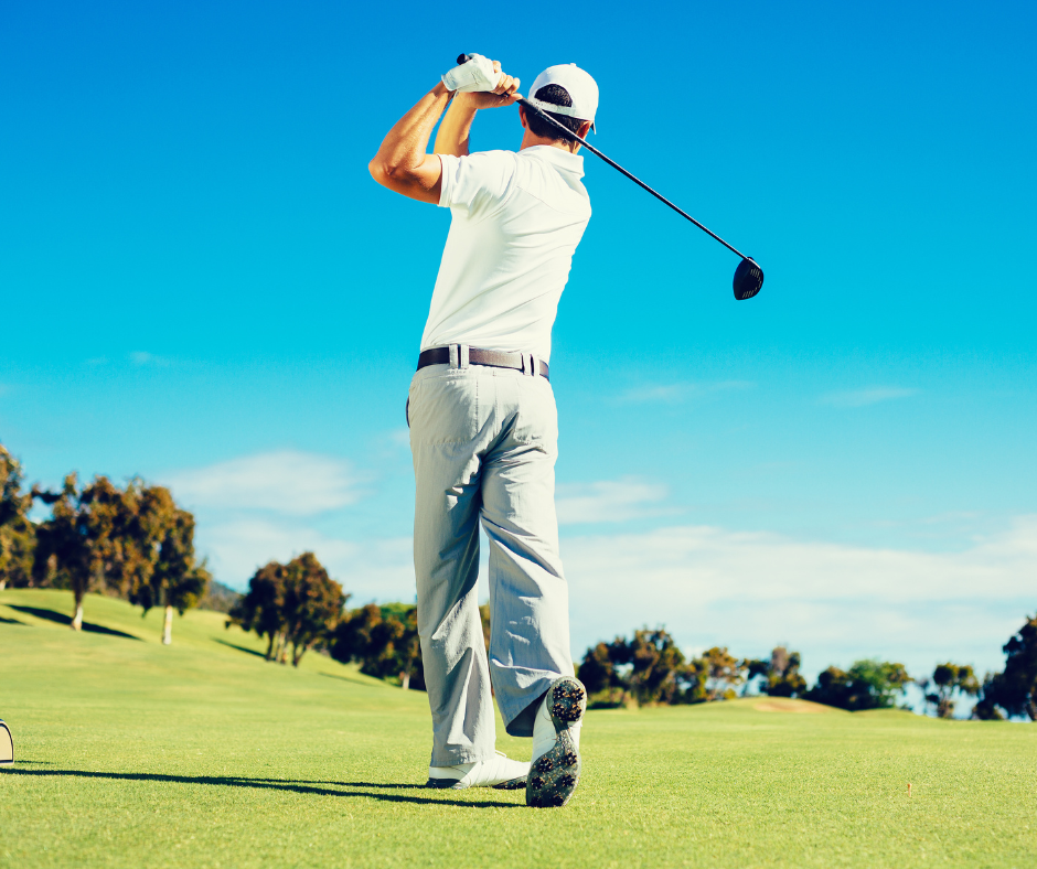 golfer swinging club